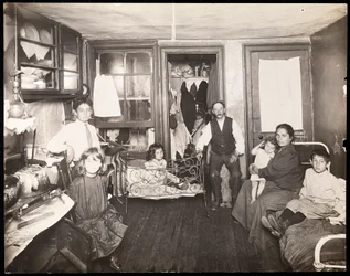 Family in Room in Tenement House